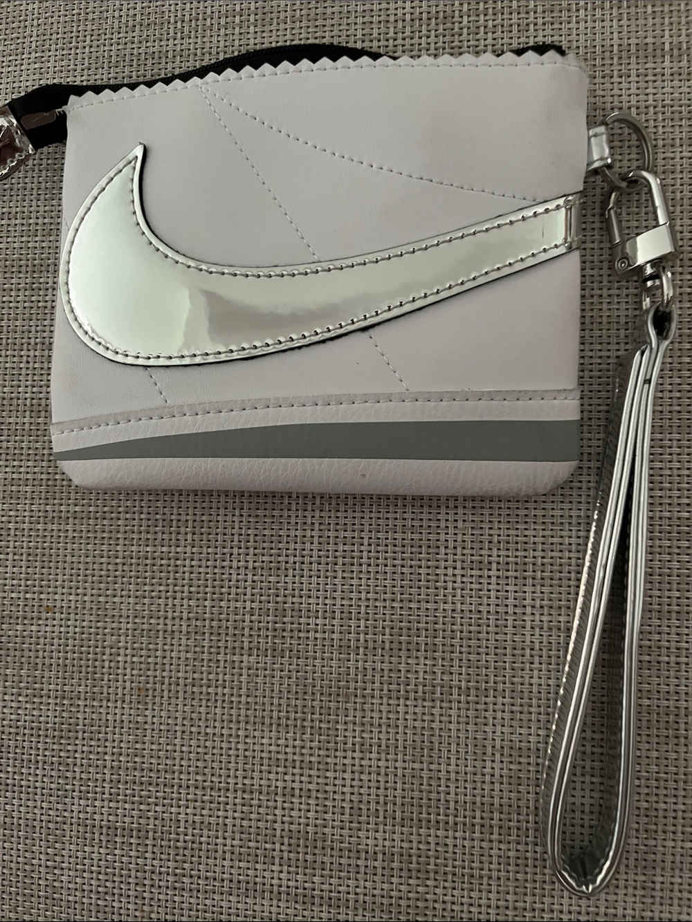 Nike White Wristlet with Silver Swoosh